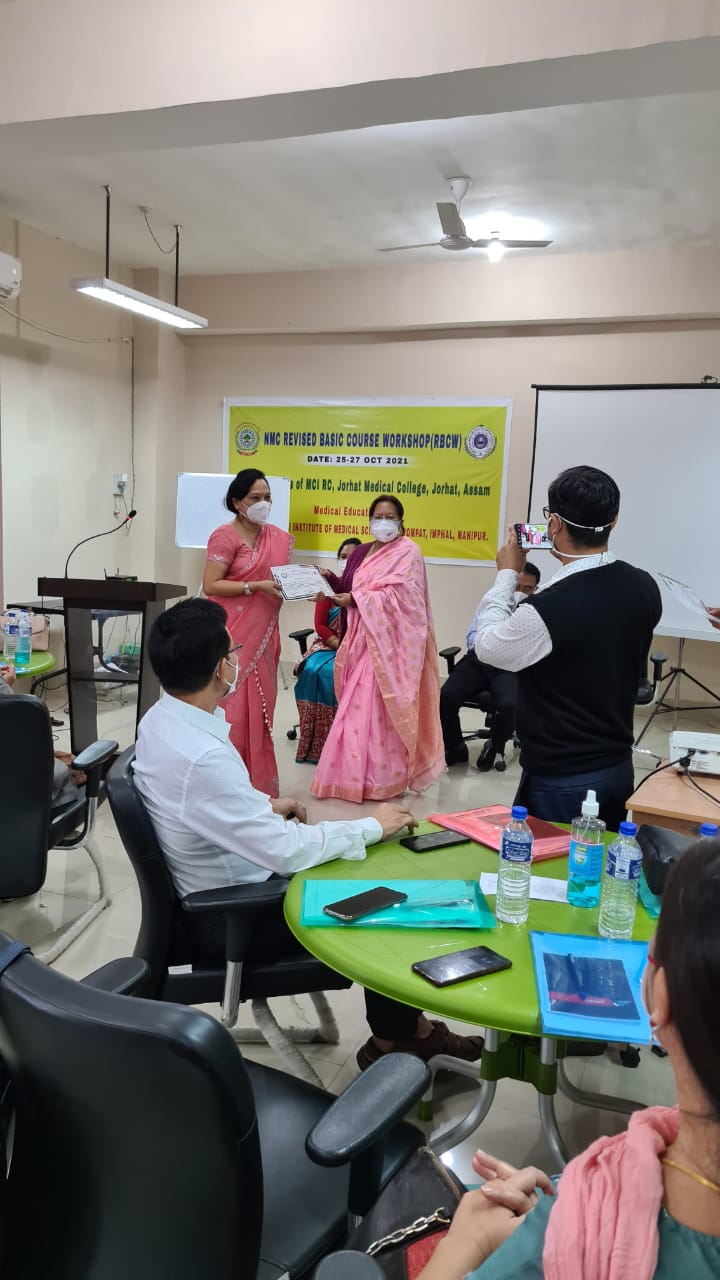 Receiving Certificate from NMC observer for Resource Person Revised Basic Workshop JNIMS 28/10/21.